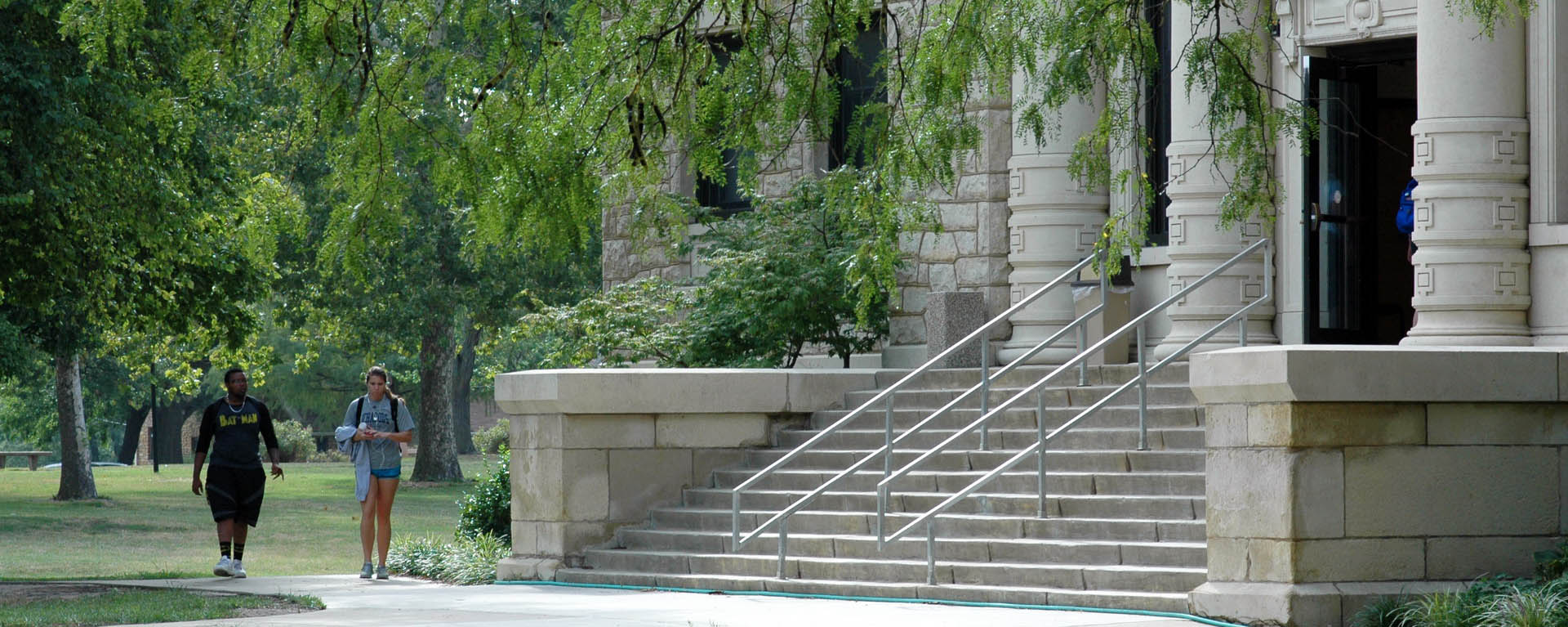 Two students walking in campus